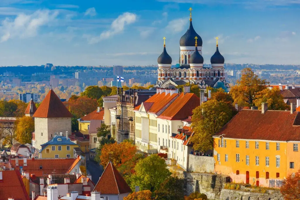 Photo of View of Tallinn's cityscape featuring the Alexander Nevsky Cathedral and colorful rooftops. | Wander Sober