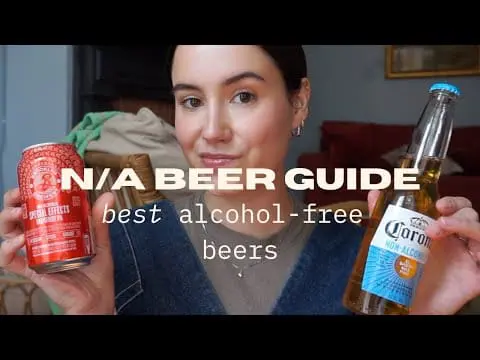 Photo of Person holding a can of non-alcoholic beer and a bottle of alcohol-free beer. | Wander Sober