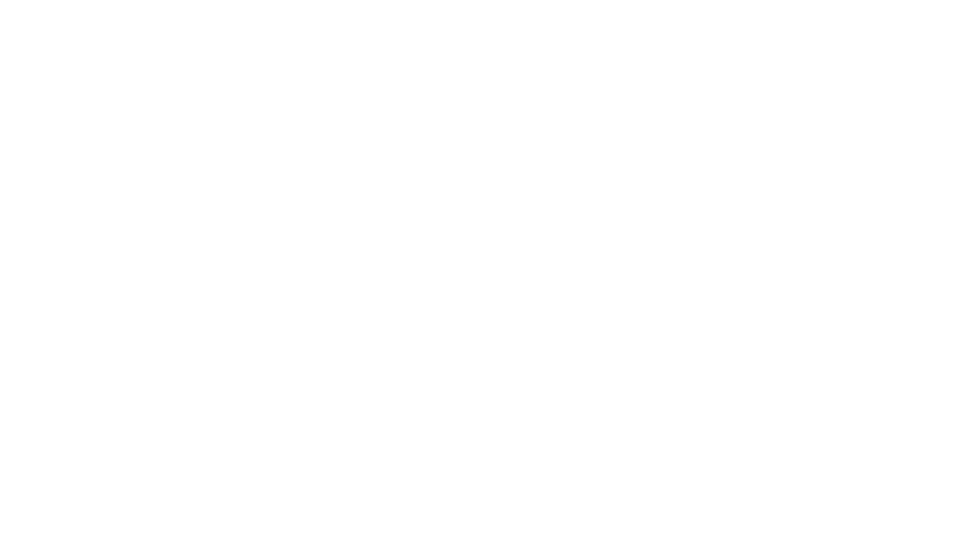 Silhouette of a mountain range in black and white against a plain background.